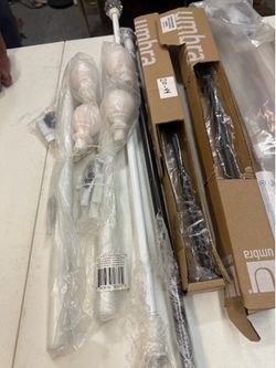 11 Curtains Rods x$40/ Sold As is