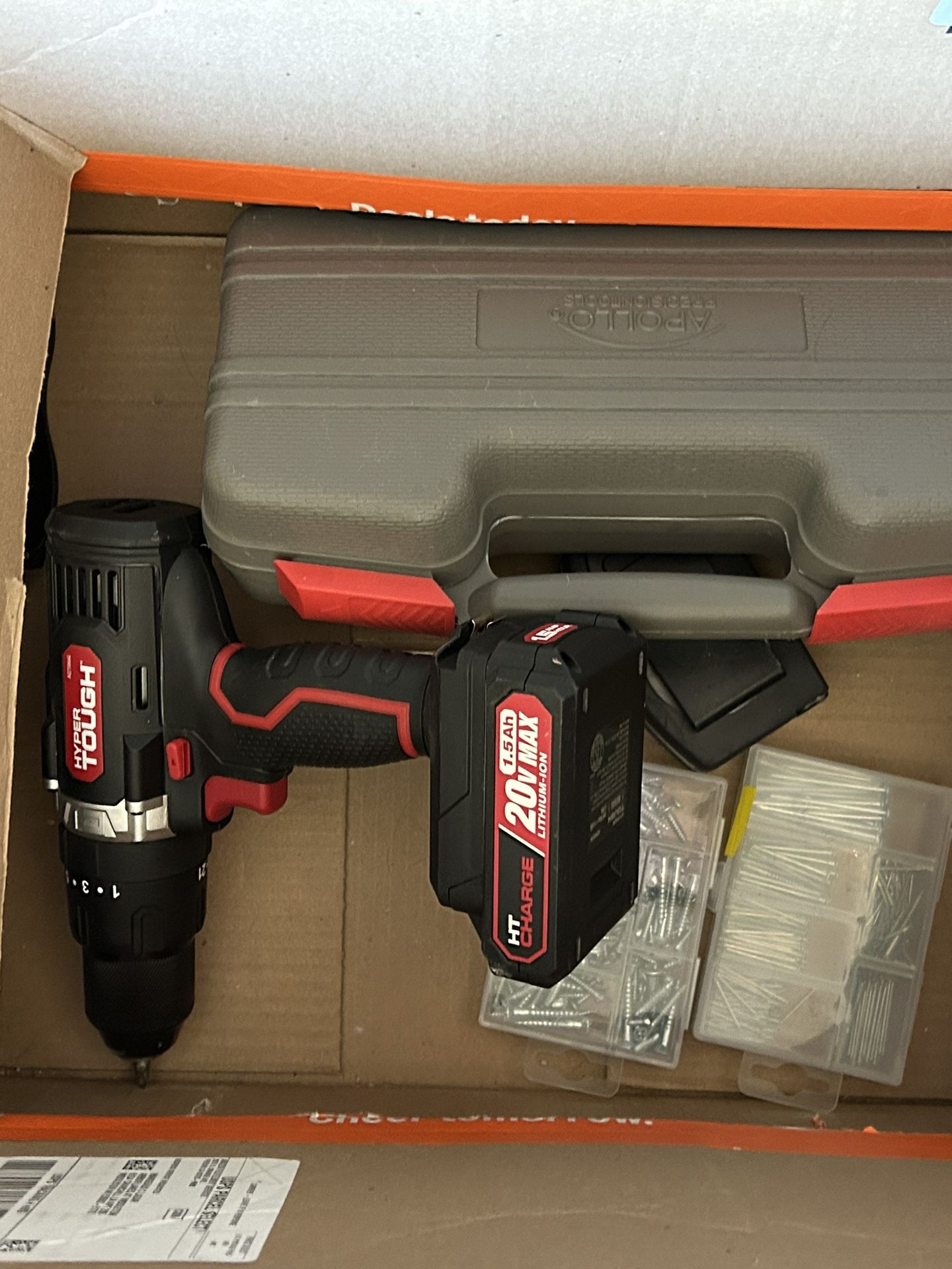Drill With Screws, Nails, And Attachments Plus Battery And Charger