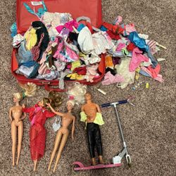 Barbie Dolls with tons of clothes 