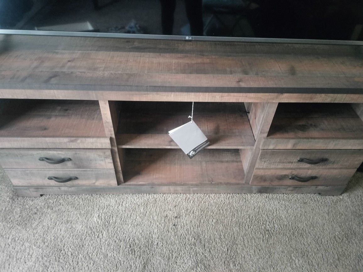 TV $100 With Stand Is $150 Other Stand Is $100