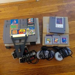 Nintendo(w/ Controllers)/Super Nintendo(w/ Controllers)/8 Games(5 Nintendo, 3 Gameboy)/Game Genie