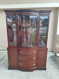 Drexel New Travis Court mahogany bow-front china cabinet