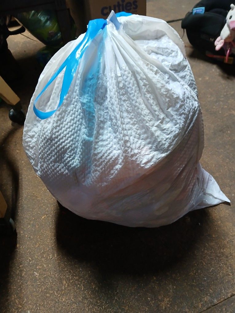 13 Gallon White Trash Bag Full Of Baby Girl Clothes