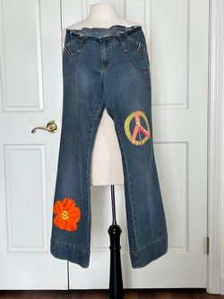 Vintage bell bottoms jeans with appliqués