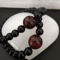 New, Beautiful Red Tiger Eye Stone And Black Onyx Bracelet. Men And Women Size Available. $20 Each
