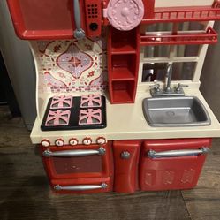 Toy kitchen and refrigerator