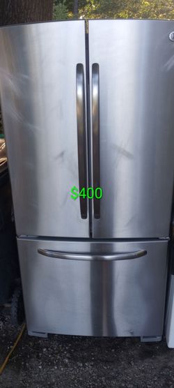 Absolutely beautiful three door French door stainless steel GE refrigerator bad to the Bone 🍗🍗🍗