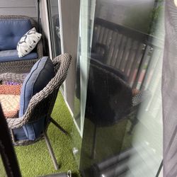 Disassembled Glass Table Ready With Chairs For Pick Up 