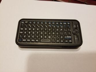 Apple TV keyboard remote control holder