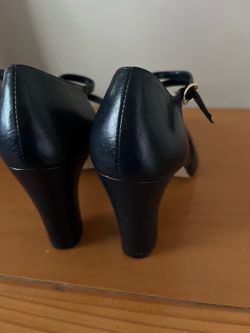 There very nice shoes in Size 8.5 M The Color is Navy Blue made by Karen Scott there brand new