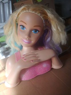 A Barbie doll so you can practice on doing the hair