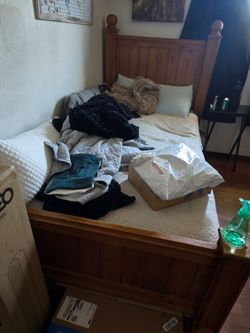 Wood bed frame with mattress