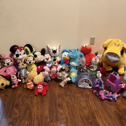 Lot Of Disney Toys: Disney Mickey Mouse, Minnie Mouse, Pluto, Daffy, Elmo, Peppa pig, Olaf, Nemo, Sully, Timone, E.B.