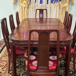 I AM SELLING THE REAL WOOD DINING 100% TABLE WITH 8 chairs . Very strong chairs and table  Table long 84 inches with 2 leaves  Each leaf 18 inches  Wi