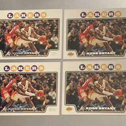 Lot of 4 Kobe Bryant 2008-09 Topps # 24 sports cards featuring Lebron James