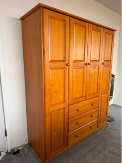 100% Solid wood wardrobe/closet for sale Hundred percent Solid, wood wardrobe/closet for sale