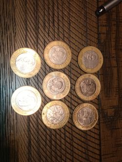 Lote de 8 monedas de 20 pesos de mexico