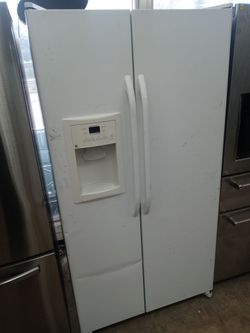 GE white side by side refrigerator - Free delivery