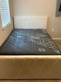 Sealy Mattress with White Upholstered Bed Frame