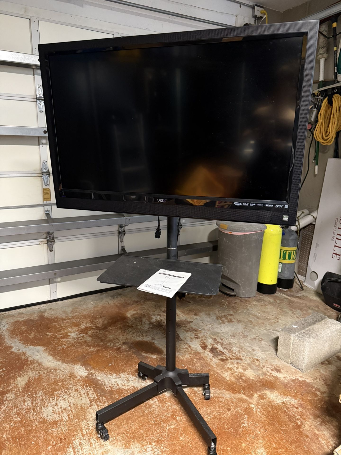 Trolley Stand plus a 42”Vizio TV