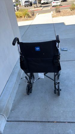 Wheelchair walker, excellent condition super super light easy to fold and curry