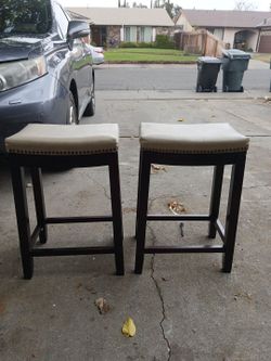 Pair Of Beige Backless Counter-Height Bar Stools