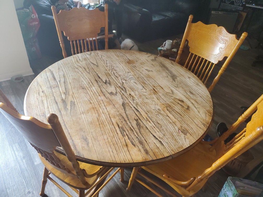 Antique wooden table (6 chairs and table extension)