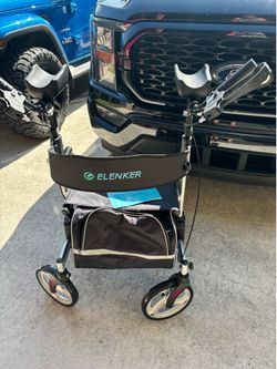 upright rollator walker by Elenker with seat, backrest and pouch. Very good condition