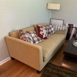 Beige or cream couch converts to day bed. Crate & Barrel