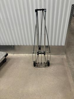 Tall carrying  luggage cart $40