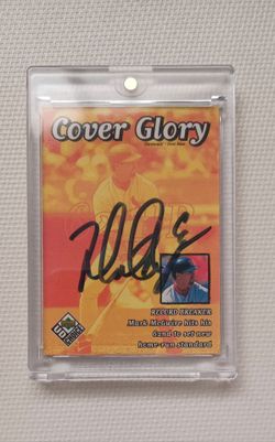 1999 UPPER DECK MARK MCGWIRE AUTOGRAPHED BASEBALL CARD WITH COA AND HOLOGRAM