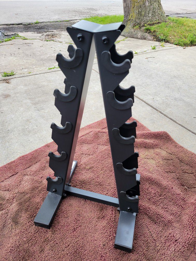 SMALL. A-FRAME  DUMBBELL RACK  HOLDS 5 SETS  ( SMALLER)  2 AVAILABLE 
7111.S WESTERN WALGREENS 
$30. EACH.  CASH ONLY AS IS