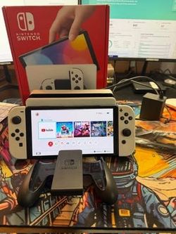 Awesome condition Switch Oled with 128gb SD card