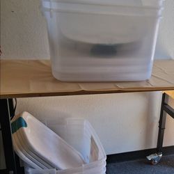 6 stackable plastic storage bins with lids $5 each