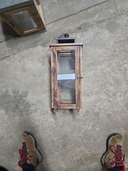 Wooden outdoor decorative lantern with
metal top