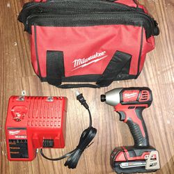 MILWAUKEE 1/4" IMPACT DRIVER  WITH BATTERY AND CHARGER
