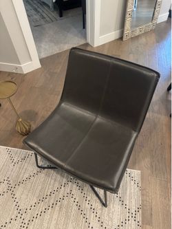 Two Slope Leather Lounge Chairs