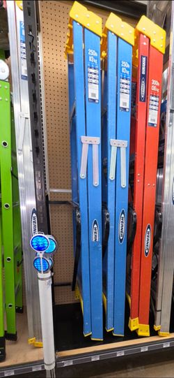 New, unused 6-foot fiberglass ladders.