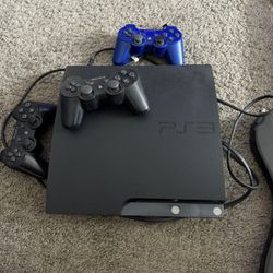 PS3 Slim, Controllers, 7 games, Rock Band guitar and mic