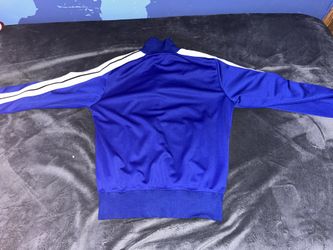 Blue shop tracksuit top