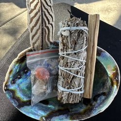 New, Beautiful Smudging Set. Includes Sage, Palo Santo, Abalone Shell, Mixed Crystals And Feather. Gift Box And Gift Bag Included. Great Gift.