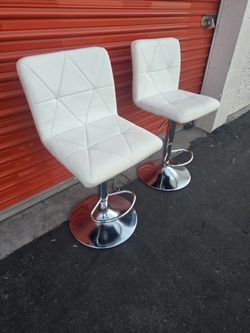 Two White Adjustable Barstools 
