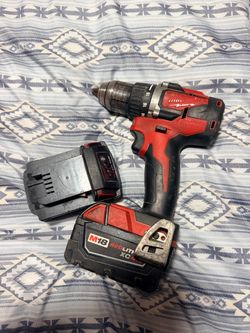 Milwaukee drill and two batteries
