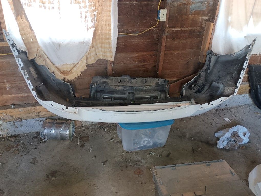 4 Doors with windows and no dents and a Trunk and rear bumper for all a 1000 or best offer