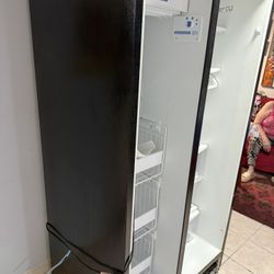 Whirlpool refrigerator 28 in depth 36 in wide 72 high with ice and water dispens