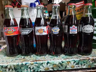 6 different Coca-Cola NASCAR track bottles
