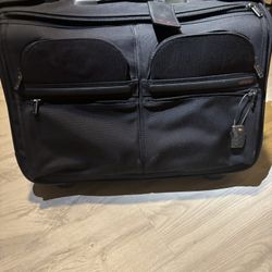 TUMI  Black Garment 4 Wheeled Carry-On 
