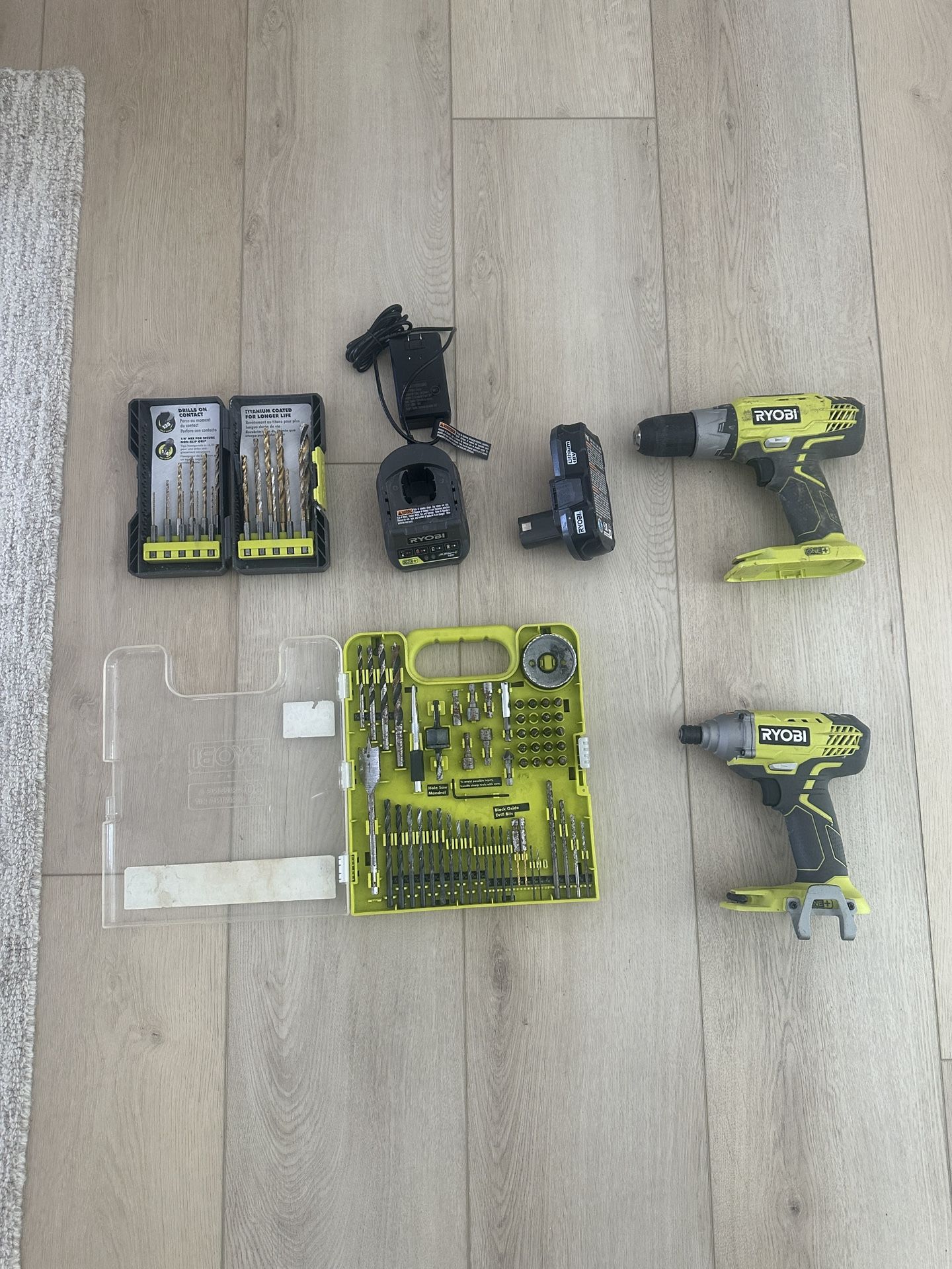 Ryobi Drill/Impact Driver with lots of drill bits
