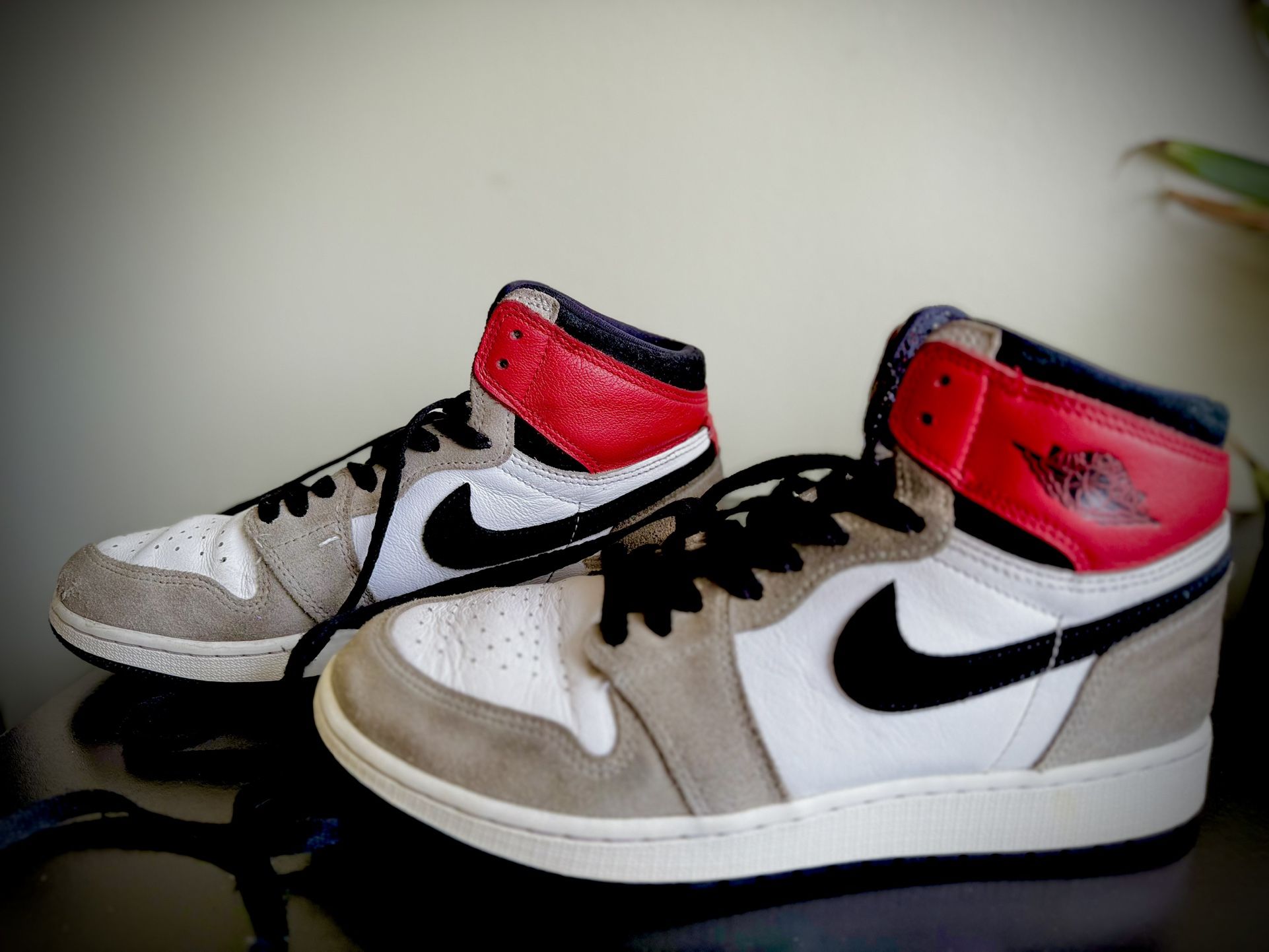 Air Jordan 1s In The Color Red White And Grey
