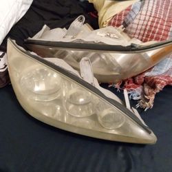 Two Good Condition Headlights Covers 
